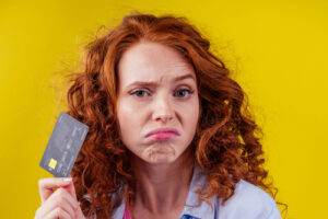 woman holding credit card