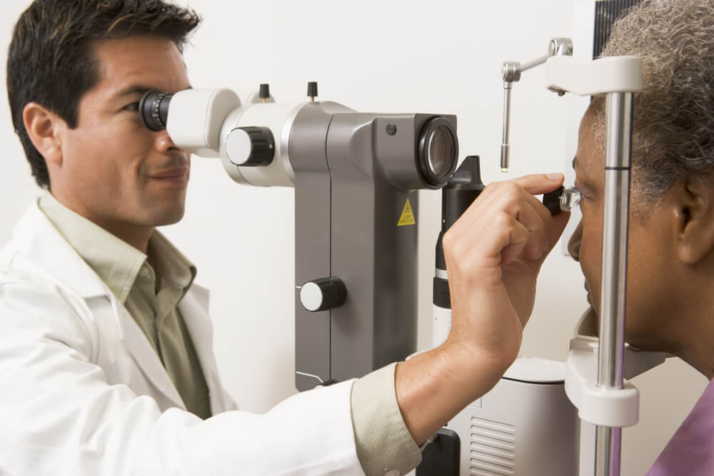 Woman having eyes examined