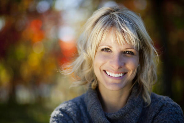 Woman smiling outside